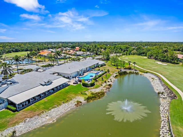 6893 Sterling Grns Unit 201, Naples, FL 34104 - bird's eye view of a large body of water, a local golf course, a pool, and a tree filled landscape