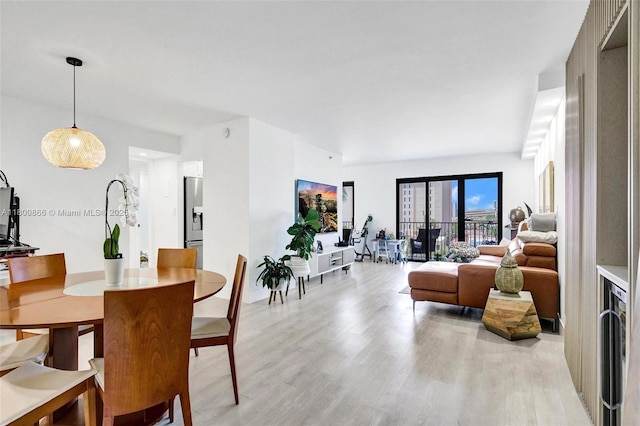 1201 S Ocean Dr Unit 404N, Hollywood, FL 33019 - dining area featuring light wood-style flooring