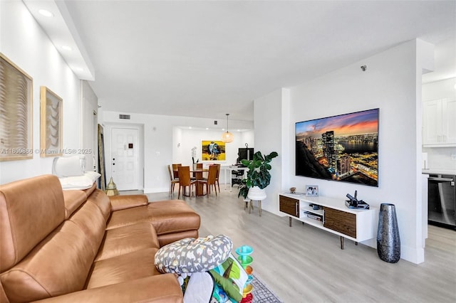 1201 S Ocean Dr Unit 404N, Hollywood, FL 33019 - living area with light wood finished floors, baseboards, and recessed lighting