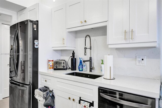 1201 S Ocean Dr Unit 404N, Hollywood, FL 33019 - kitchen featuring appliances with stainless steel finishes and white cabinets