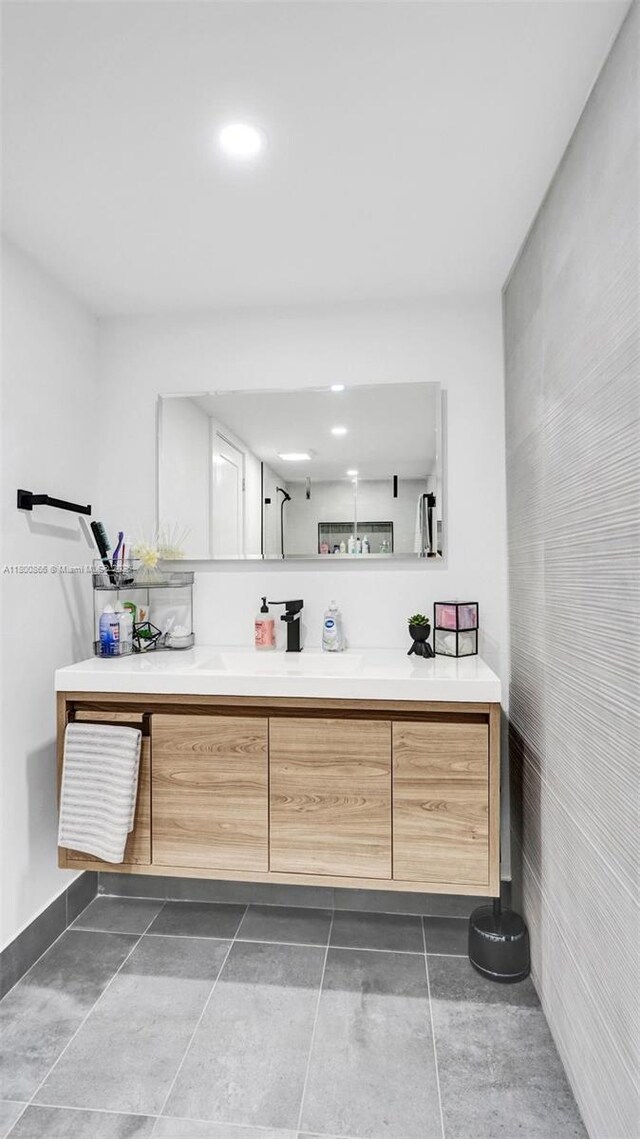 1201 S Ocean Dr Unit 404N, Hollywood, FL 33019 - bathroom with vanity, recessed lighting, tile patterned floors, and baseboards