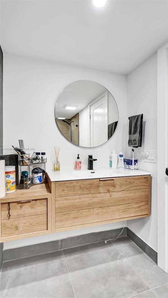 1201 S Ocean Dr Unit 404N, Hollywood, FL 33019 - bathroom with vanity, baseboards, and tile patterned flooring