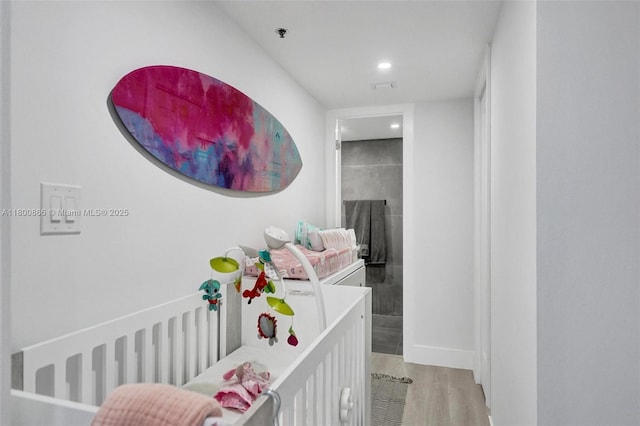 1201 S Ocean Dr Unit 404N, Hollywood, FL 33019 - bedroom with wood finished floors, recessed lighting, and a large fireplace