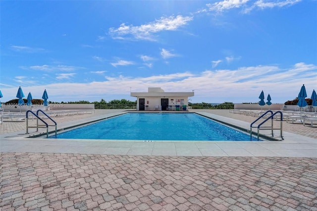 1201 S Ocean Dr Unit 404N, Hollywood, FL 33019 - community pool featuring a patio