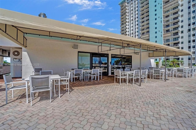 1201 S Ocean Dr Unit 404N, Hollywood, FL 33019 - view of patio / terrace featuring outdoor dining space
