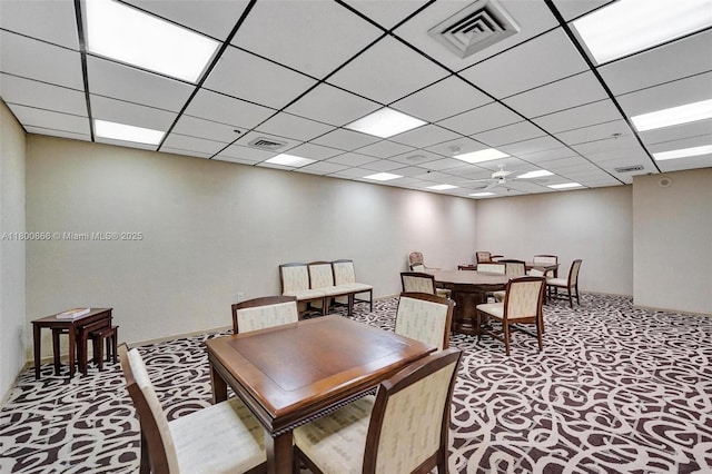 1201 S Ocean Dr Unit 404N, Hollywood, FL 33019 - dining space with carpet flooring, ceiling fan, and a paneled ceiling