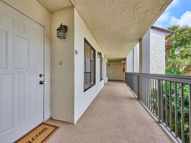 5380 Cedar Lake Dr Unit 204, Boynton Beach, FL 33437 - property entrance featuring stucco siding