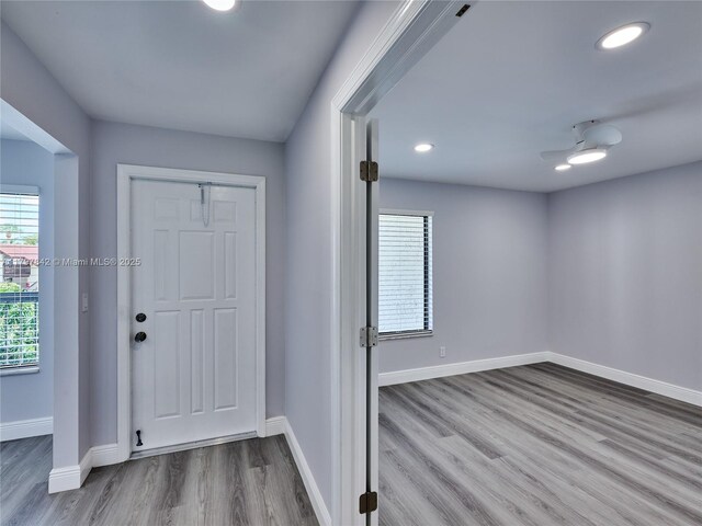 5380 Cedar Lake Dr Unit 204, Boynton Beach, FL 33437 - entrance foyer featuring wood finished floors, baseboards, and recessed lighting