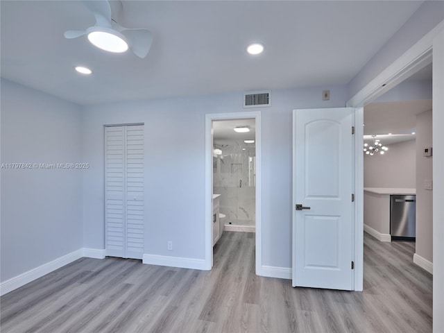 5380 Cedar Lake Dr Unit 204, Boynton Beach, FL 33437 - unfurnished bedroom with light wood finished floors, baseboards, connected bathroom, a closet, and recessed lighting