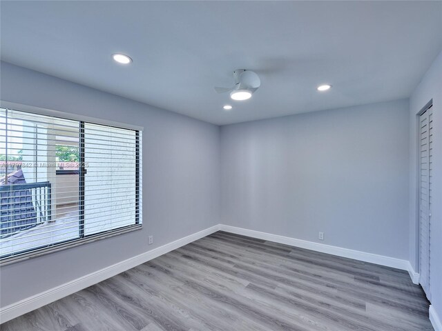 5380 Cedar Lake Dr Unit 204, Boynton Beach, FL 33437 - unfurnished bedroom with wood finished floors, recessed lighting, baseboards, and a ceiling fan