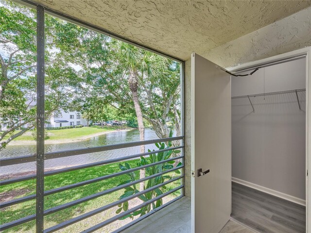 5380 Cedar Lake Dr Unit 204, Boynton Beach, FL 33437 - balcony featuring a water view