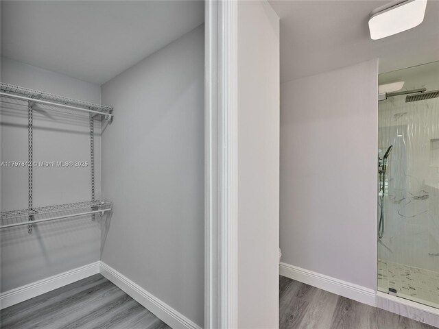 5380 Cedar Lake Dr Unit 204, Boynton Beach, FL 33437 - spacious closet featuring wood finished floors