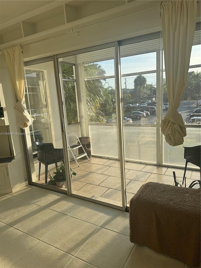 3000 NE 16th Ave Unit 209, Oakland Park, FL 33334 - doorway to outside featuring plenty of natural light