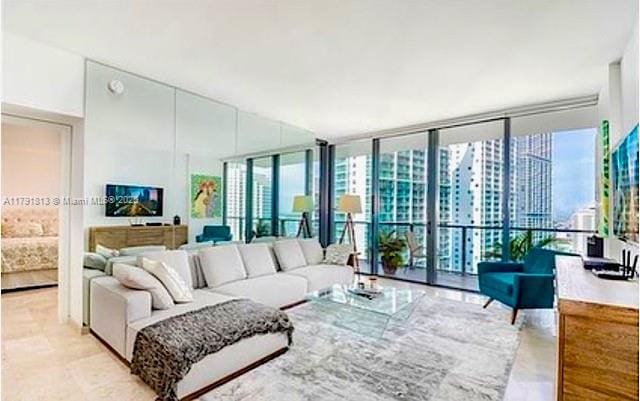 living room featuring expansive windows