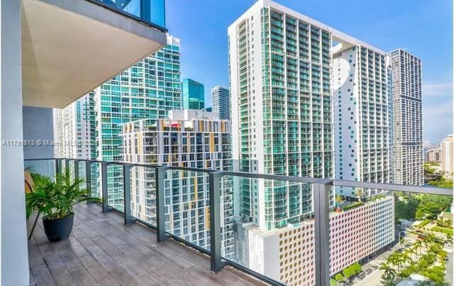 balcony featuring a view of city