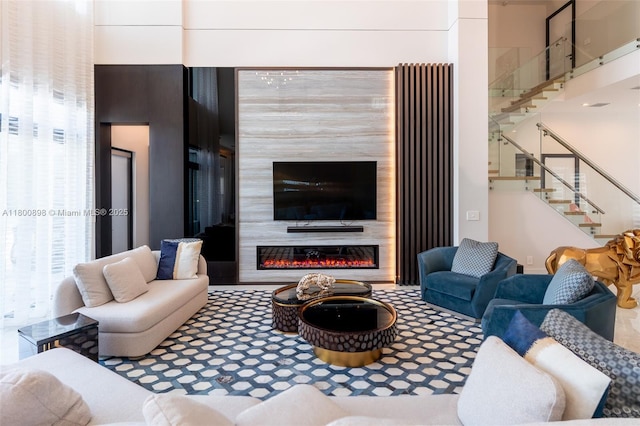 9625 Vescovato Way, Boca Raton, FL 33496 - living area with stairway and a fireplace