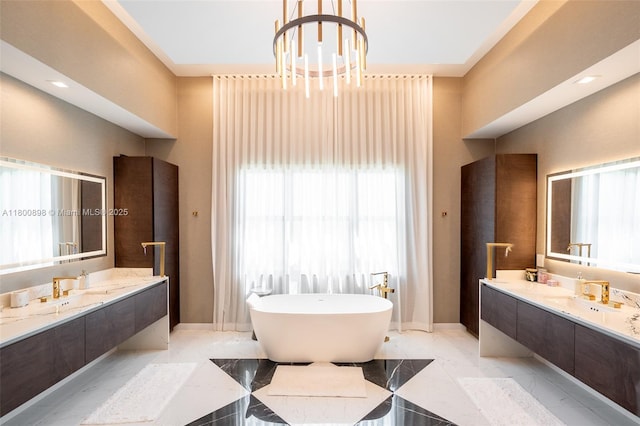 9625 Vescovato Way, Boca Raton, FL 33496 - bathroom featuring a soaking tub, vanity, a chandelier, and marble tiled floors