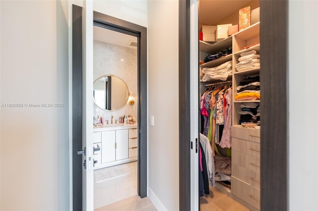 9625 Vescovato Way, Boca Raton, FL 33496 - walk in closet with light tile patterned floors