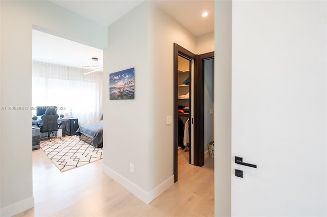 9625 Vescovato Way, Boca Raton, FL 33496 - hall with light wood finished floors, a desk, baseboards, and recessed lighting