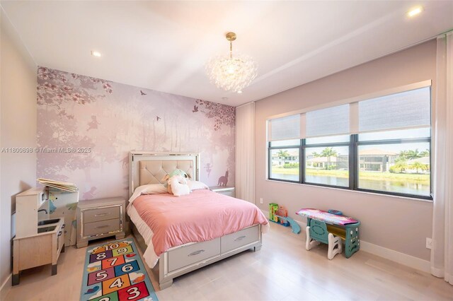 9625 Vescovato Way, Boca Raton, FL 33496 - bedroom featuring wallpapered walls, a chandelier, baseboards, recessed lighting, and light wood-type flooring