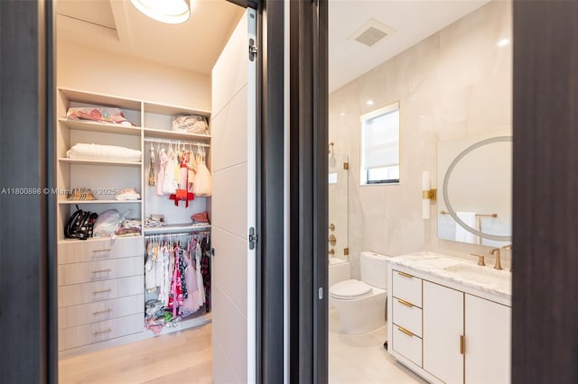 9625 Vescovato Way, Boca Raton, FL 33496 - full bathroom featuring vanity, toilet, and a spacious closet