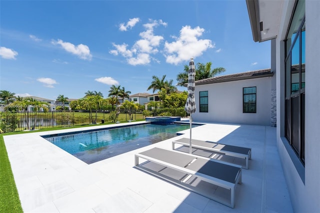 9625 Vescovato Way, Boca Raton, FL 33496 - view of swimming pool featuring a patio, fence, a water view, and a pool with connected hot tub