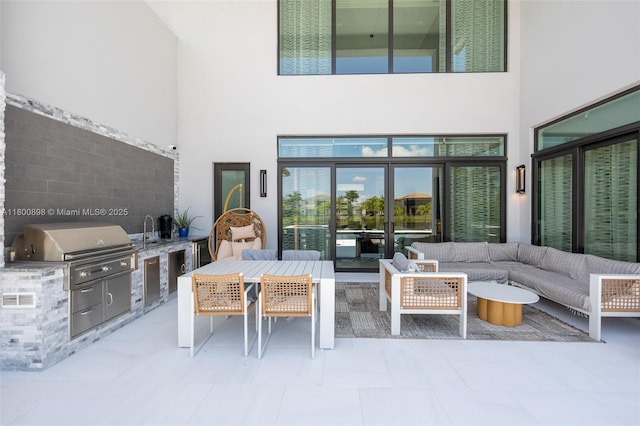 9625 Vescovato Way, Boca Raton, FL 33496 - view of patio / terrace featuring an outdoor kitchen, outdoor lounge area, area for grilling, a sink, and outdoor dining space