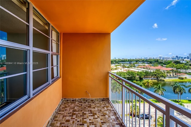balcony with a city view and a water view