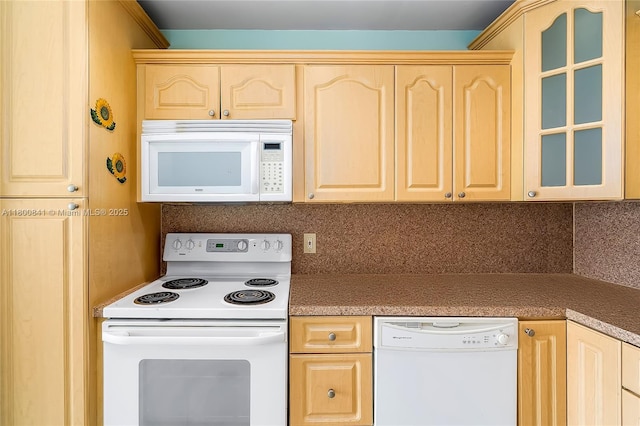 kitchen featuring white appliances, light brown cabinetry, glass insert cabinets, and backsplash