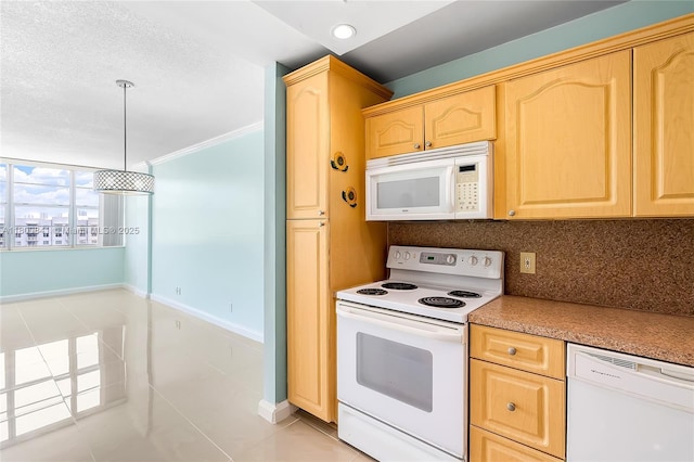kitchen with white appliances, light brown cabinetry, light tile patterned floors, backsplash, and crown molding