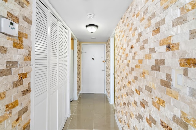 hall featuring tile patterned floors