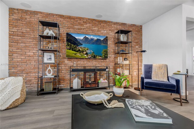 9621 SW 59th Ter, Miami, FL 33173 - living area with wood finished floors and brick wall