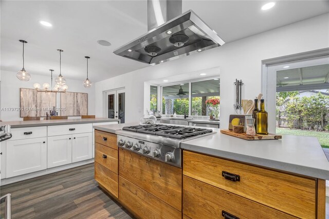 9621 SW 59th Ter, Miami, FL 33173 - kitchen with stainless steel gas cooktop, exhaust hood, dark wood-style floors, healthy amount of natural light, and recessed lighting