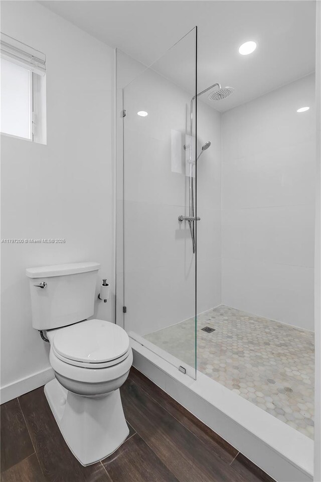 9621 SW 59th Ter, Miami, FL 33173 - full bathroom featuring tiled shower, toilet, wood finished floors, and recessed lighting