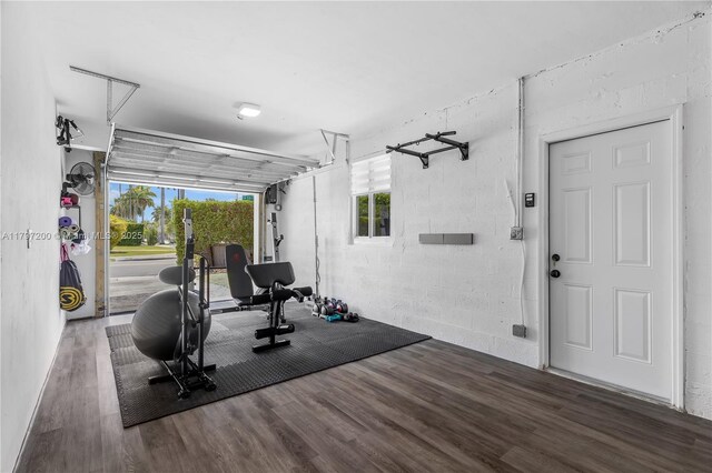 9621 SW 59th Ter, Miami, FL 33173 - workout area with a garage and wood finished floors