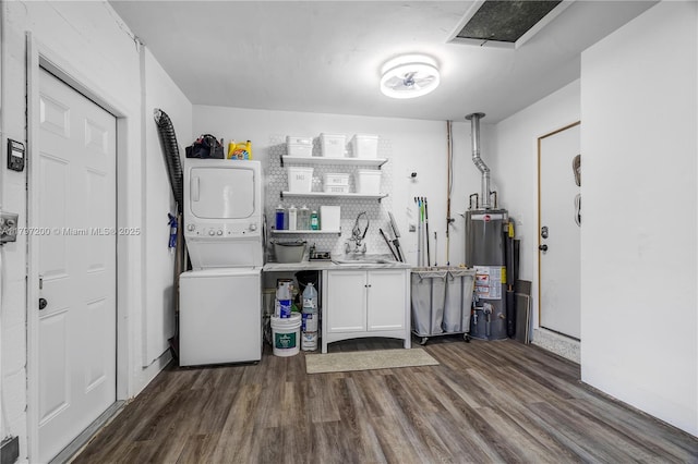 9621 SW 59th Ter, Miami, FL 33173 - washroom featuring stacked washer / dryer, gas water heater, dark wood finished floors, and cabinet space