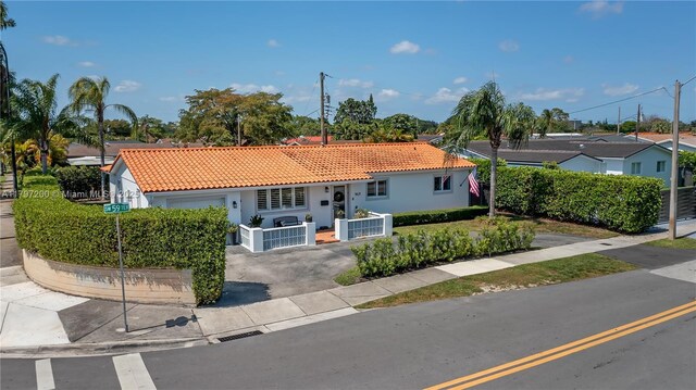 9621 SW 59th Ter, Miami, FL 33173 - view of front of house featuring a tiled roof and stucco siding