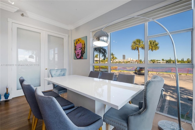 20505 E Country Club Dr Unit 143, Aventura, FL 33180 - dining area featuring wood finished floors, ornamental molding, and french doors