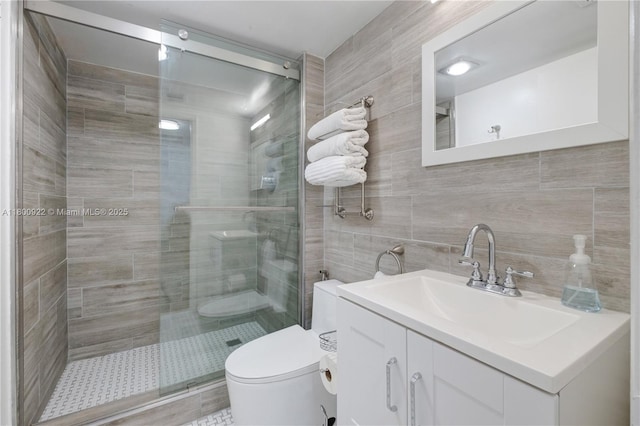 20505 E Country Club Dr Unit 143, Aventura, FL 33180 - full bath with a shower stall, toilet, tile walls, vanity, and backsplash