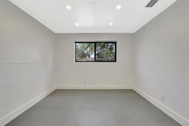 129 NE 2nd Ave, Dania Beach, FL 33004 - unfurnished room featuring baseboards, recessed lighting, and tile patterned flooring
