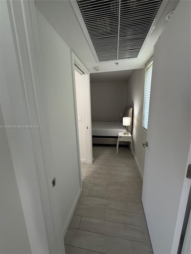 1601 Meridian Ave Unit 101, Miami Beach, FL 33139 - hall featuring baseboards and light wood-type flooring