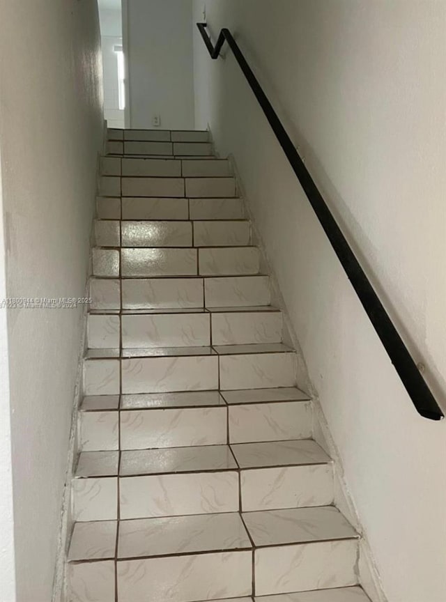 307 NW 84th St Unit 307, Miami, FL 33150 - stairway with marble finish flooring