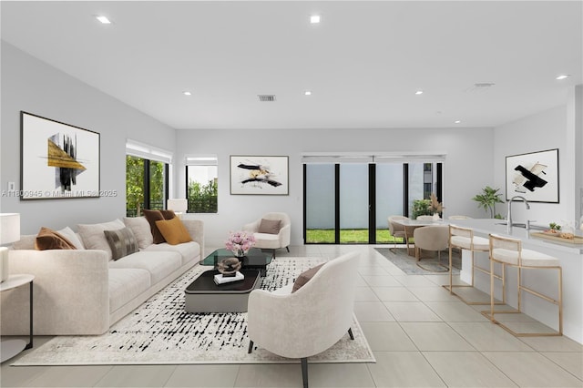 8271 NW 48th Ter, Doral, FL 33166 - living room with recessed lighting and light tile patterned floors
