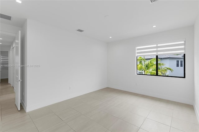 8271 NW 48th Ter, Doral, FL 33166 - empty room with recessed lighting, light tile patterned floors, and baseboards