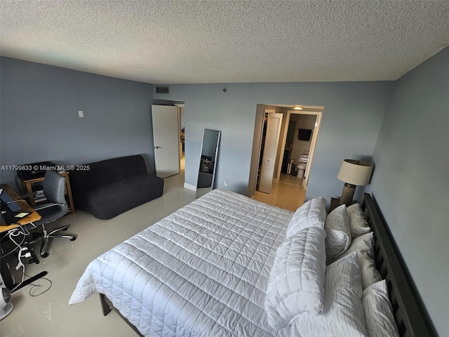 3850 Washington St Unit 704, Hollywood, FL 33021 - bedroom featuring a textured ceiling