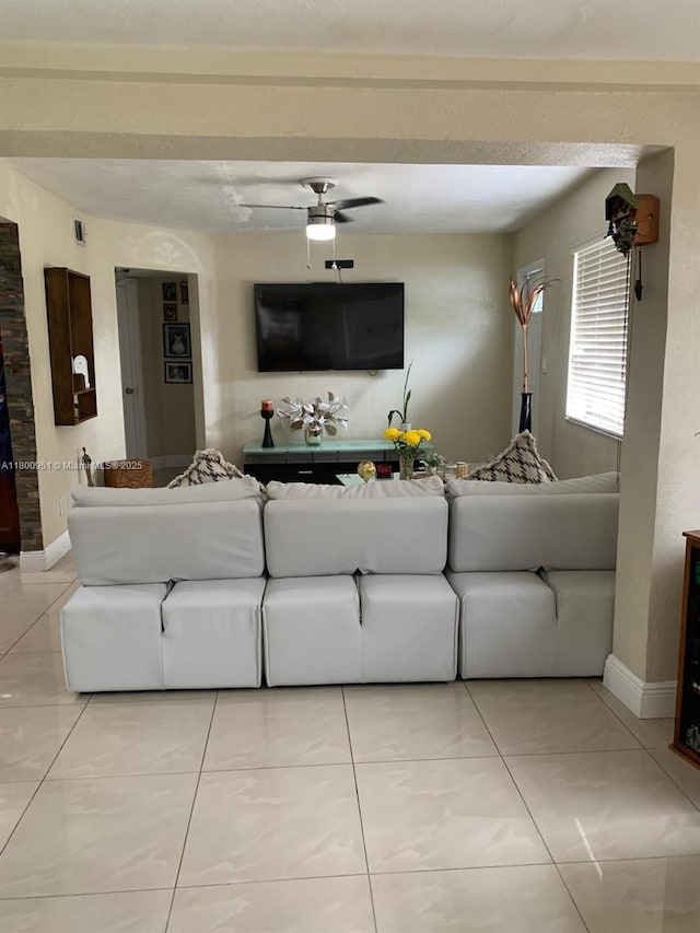 519 S 61st Ave, Hollywood, FL 33023 - living area with a ceiling fan, baseboards, and light tile patterned floors