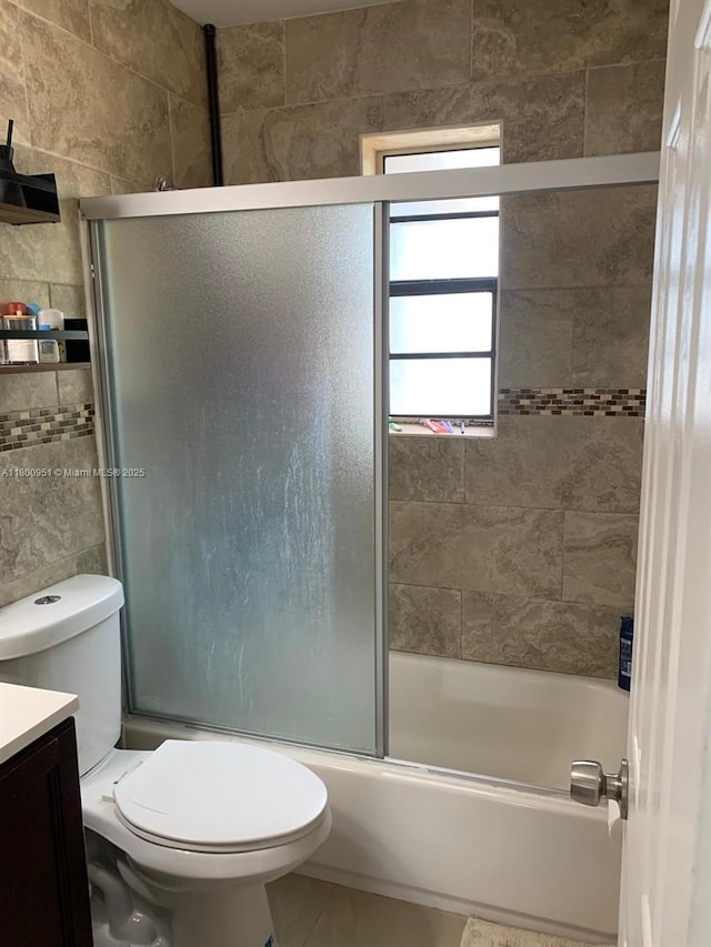 519 S 61st Ave, Hollywood, FL 33023 - bathroom with enclosed tub / shower combo, vanity, and toilet