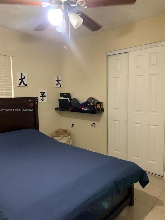 519 S 61st Ave, Hollywood, FL 33023 - tiled bedroom featuring ceiling fan and a closet
