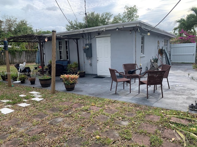 519 S 61st Ave, Hollywood, FL 33023 - rear view of house with fence, a patio, and a pergola