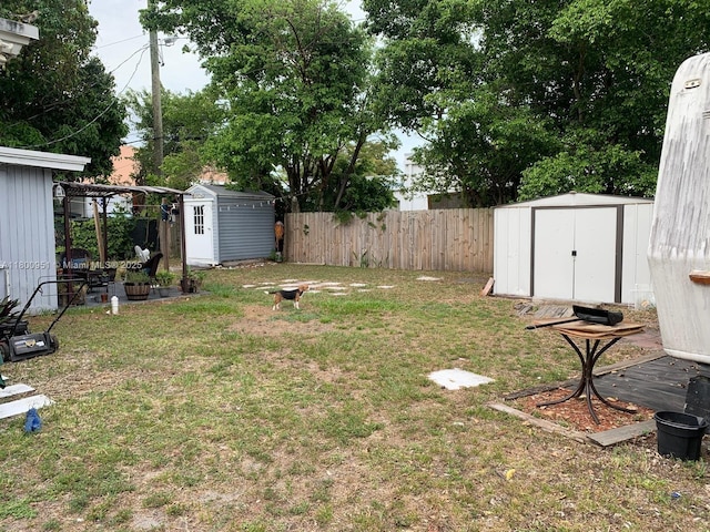 519 S 61st Ave, Hollywood, FL 33023 - view of yard with a storage shed and an outdoor structure